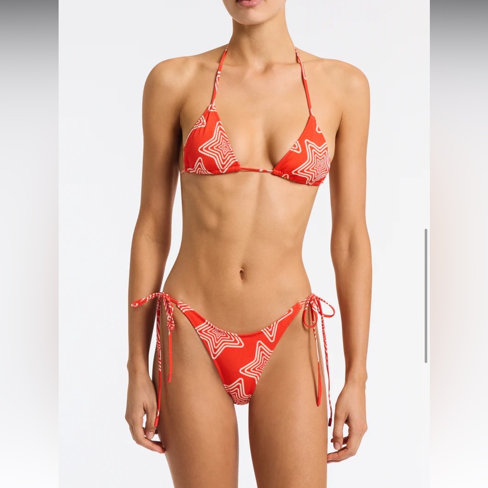 New with tags never worn triangl swim suit- bottoms XS, Top M